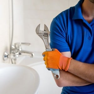 Plumber with tools